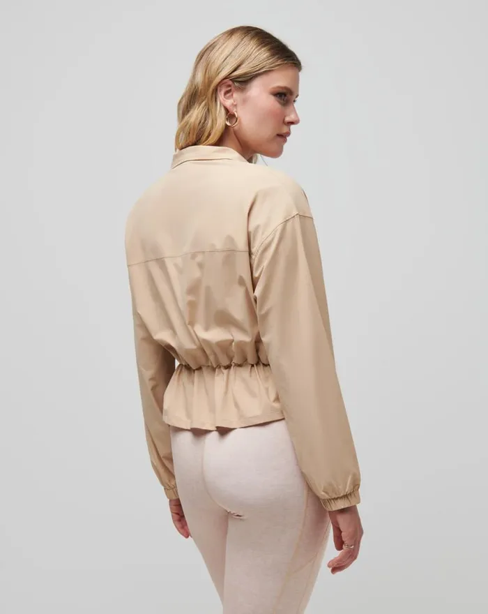TravisMathew GIRLS WEEKEND TECH WOVEN JACKET Cuban Sand Women Jackets TravisMathew GIRLS WEEKEND TECH WOVEN JACKET Cuban Sand Women Jackets