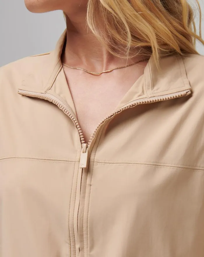 TravisMathew GIRLS WEEKEND TECH WOVEN JACKET Cuban Sand Women Jackets TravisMathew GIRLS WEEKEND TECH WOVEN JACKET Cuban Sand Women Jackets