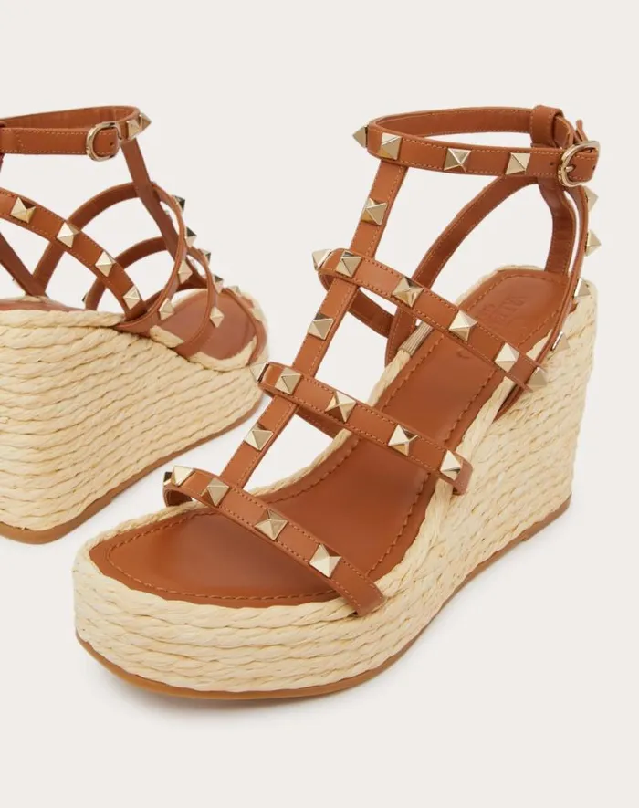 Valentino Espadrilles And Wedges Woman Rockstud Wedge Sandal With Calfskin Straps 95mm For Woman In Naturalalmond Naturalalmond Valentino Espadrilles And Wedges Woman Rockstud Wedge Sandal With Calfskin Straps 95mm For Woman In Naturalalmond Naturalalmond