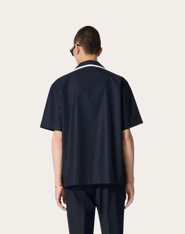 Valentino Shirts Man Cotton Poplin Bowling Shirt With Rubberized V Detail For Man In Navy Navy Valentino Shirts Man Cotton Poplin Bowling Shirt With Rubberized V Detail For Man In Navy Navy