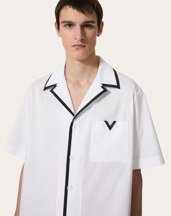 Valentino Shirts Man Cotton Poplin Bowling Shirt With Rubberized V Detail For Man In Navy Navy Valentino Shirts Man Cotton Poplin Bowling Shirt With Rubberized V Detail For Man In Navy Navy