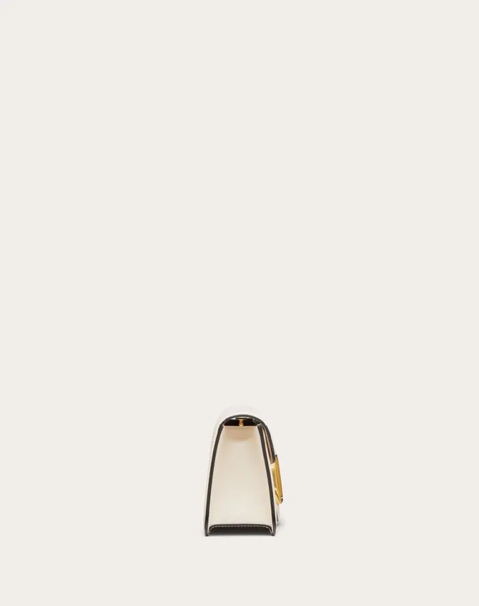 Valentino Shoulder Bags Woman Valentino Garavani Loc Calfskin Shoulder Bag For Woman In Light Ivory Light Ivory Valentino Shoulder Bags Woman Valentino Garavani Loc Calfskin Shoulder Bag For Woman In Light Ivory Light Ivory