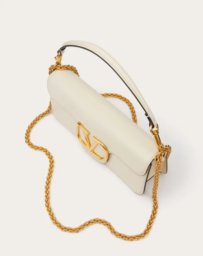 Valentino Shoulder Bags Woman Valentino Garavani Loc Calfskin Shoulder Bag For Woman In Light Ivory Light Ivory Valentino Shoulder Bags Woman Valentino Garavani Loc Calfskin Shoulder Bag For Woman In Light Ivory Light Ivory