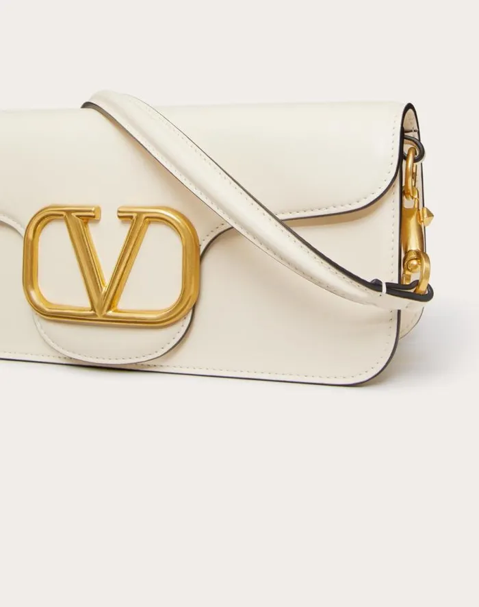 Valentino Shoulder Bags Woman Valentino Garavani Loc Calfskin Shoulder Bag For Woman In Light Ivory Light Ivory Valentino Shoulder Bags Woman Valentino Garavani Loc Calfskin Shoulder Bag For Woman In Light Ivory Light Ivory