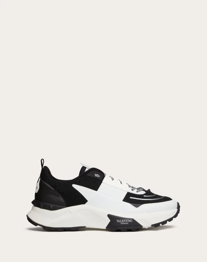 Valentino Sneakers Man True Act Low Top Sneaker In Mesh And Rubberized Fabric For Man In White Black White Black Valentino Sneakers Man True Act Low Top Sneaker In Mesh And Rubberized Fabric For Man In White Black White Black
