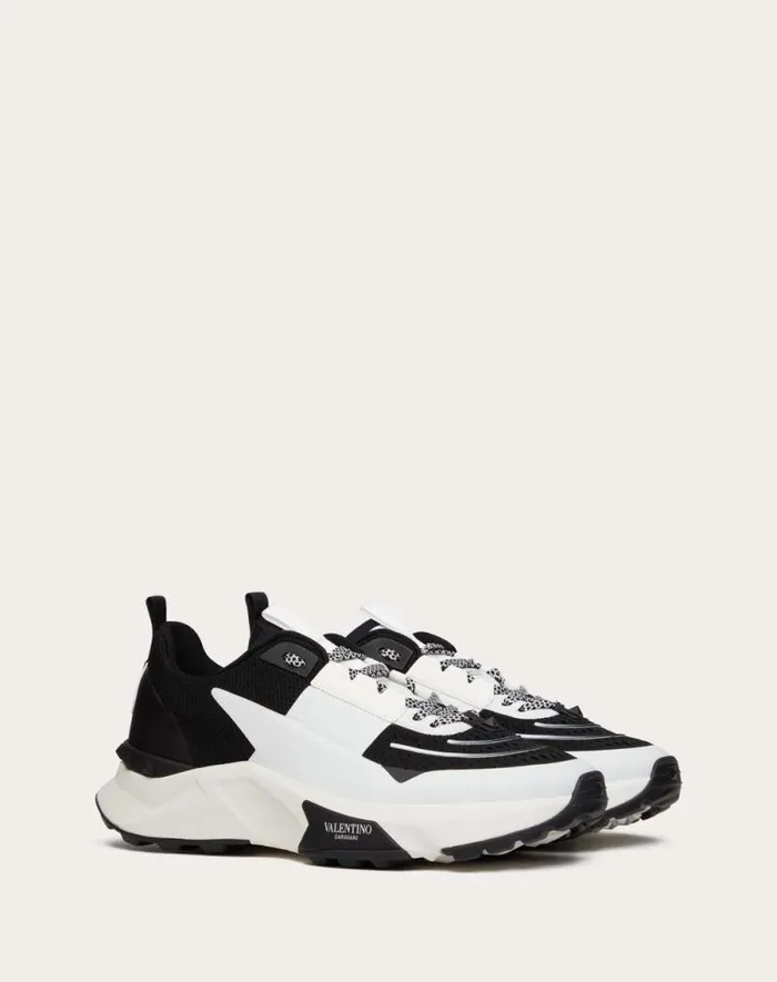 Valentino Sneakers Man True Act Low Top Sneaker In Mesh And Rubberized Fabric For Man In White Black White Black Valentino Sneakers Man True Act Low Top Sneaker In Mesh And Rubberized Fabric For Man In White Black White Black