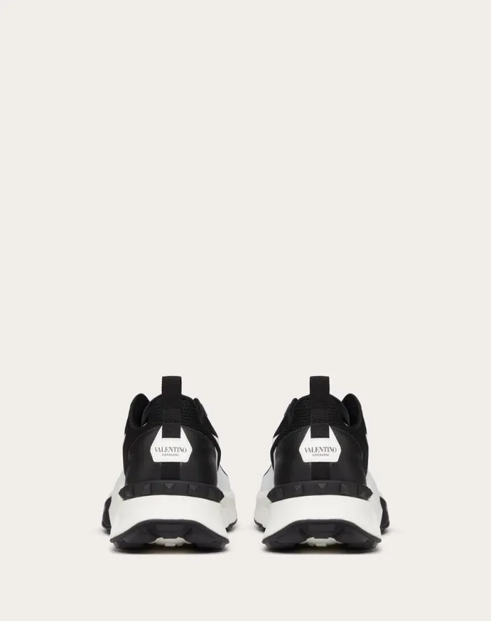 Valentino Sneakers Man True Act Low Top Sneaker In Mesh And Rubberized Fabric For Man In White Black White Black Valentino Sneakers Man True Act Low Top Sneaker In Mesh And Rubberized Fabric For Man In White Black White Black