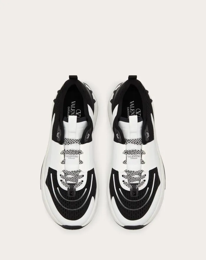 Valentino Sneakers Man True Act Low Top Sneaker In Mesh And Rubberized Fabric For Man In White Black White Black Valentino Sneakers Man True Act Low Top Sneaker In Mesh And Rubberized Fabric For Man In White Black White Black