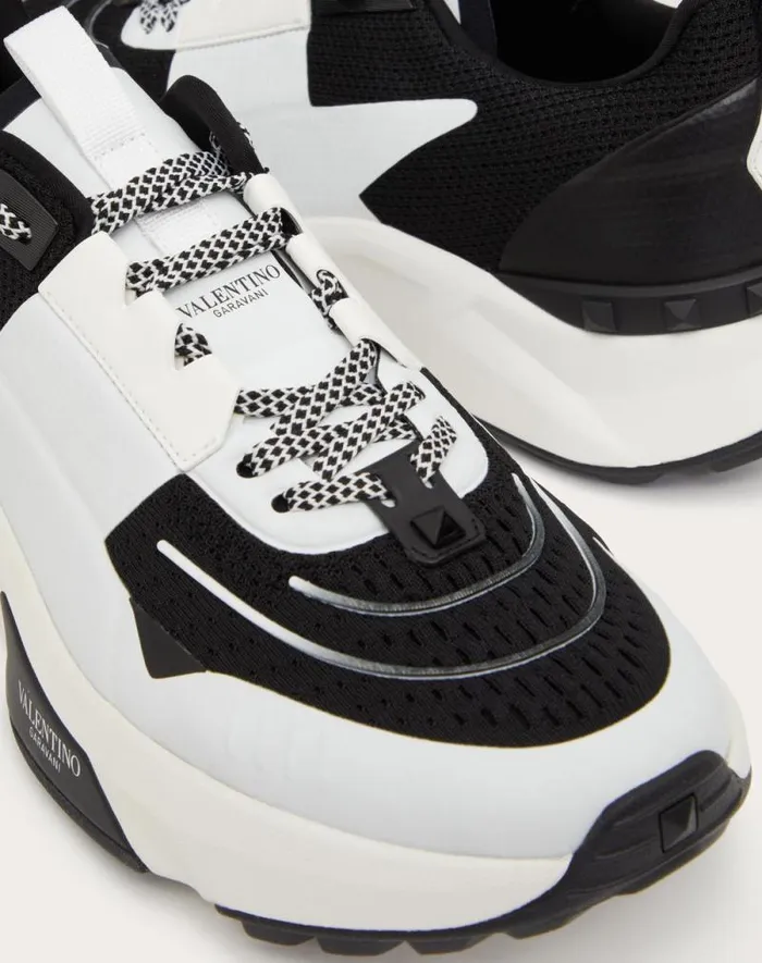 Valentino Sneakers Man True Act Low Top Sneaker In Mesh And Rubberized Fabric For Man In White Black White Black Valentino Sneakers Man True Act Low Top Sneaker In Mesh And Rubberized Fabric For Man In White Black White Black