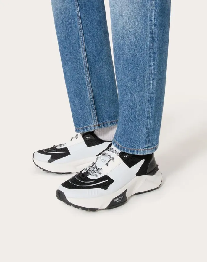 Valentino Sneakers Man True Act Low Top Sneaker In Mesh And Rubberized Fabric For Man In White Black White Black Valentino Sneakers Man True Act Low Top Sneaker In Mesh And Rubberized Fabric For Man In White Black White Black