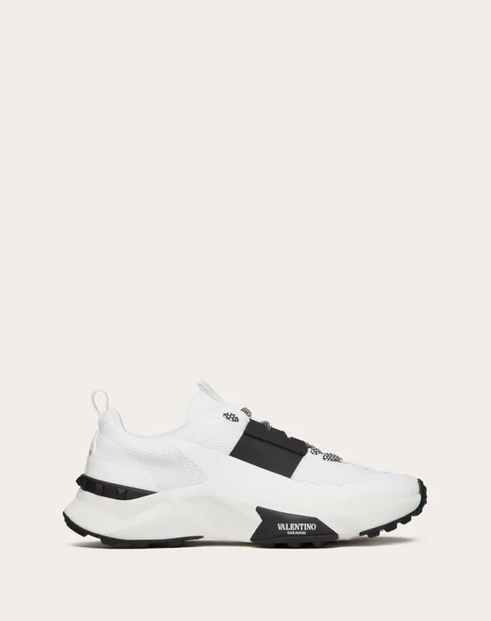 Valentino Sneakers Man True Act Low Top Sneaker In Mesh And Rubberized Fabric For Man In White Black White Black Valentino Sneakers Man True Act Low Top Sneaker In Mesh And Rubberized Fabric For Man In White Black White Black
