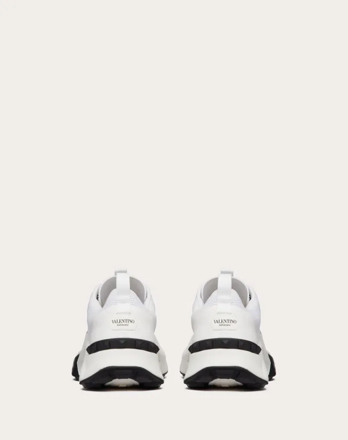 Valentino Sneakers Man True Act Low Top Sneaker In Mesh And Rubberized Fabric For Man In White Black White Black Valentino Sneakers Man True Act Low Top Sneaker In Mesh And Rubberized Fabric For Man In White Black White Black