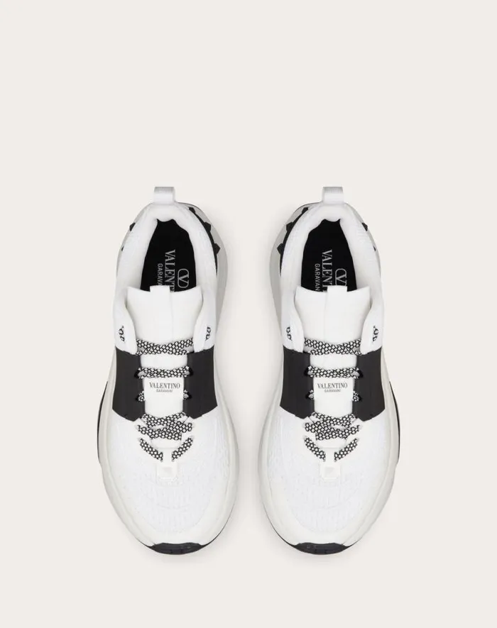 Valentino Sneakers Man True Act Low Top Sneaker In Mesh And Rubberized Fabric For Man In White Black White Black Valentino Sneakers Man True Act Low Top Sneaker In Mesh And Rubberized Fabric For Man In White Black White Black