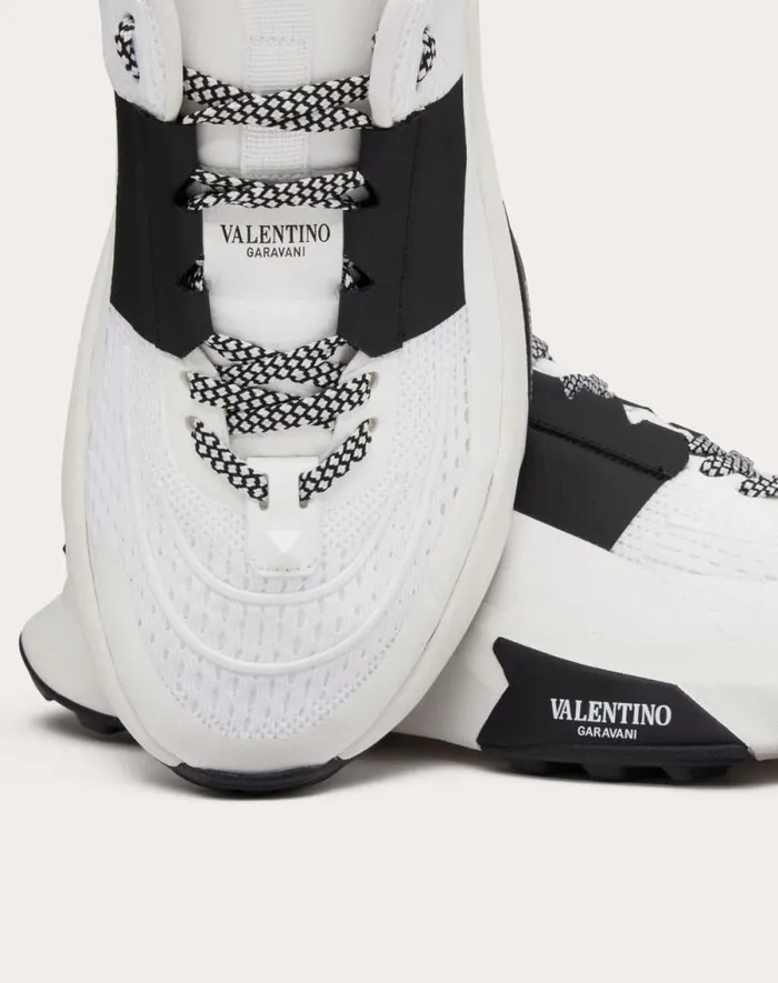 Valentino Sneakers Man True Act Low Top Sneaker In Mesh And Rubberized Fabric For Man In White Black White Black Valentino Sneakers Man True Act Low Top Sneaker In Mesh And Rubberized Fabric For Man In White Black White Black