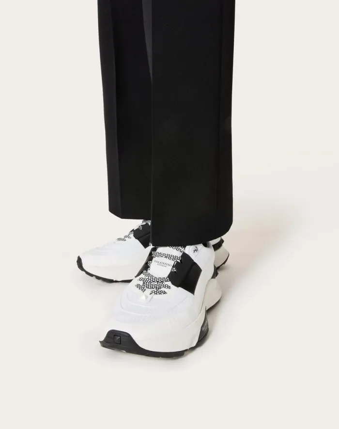 Valentino Sneakers Man True Act Low Top Sneaker In Mesh And Rubberized Fabric For Man In White Black White Black Valentino Sneakers Man True Act Low Top Sneaker In Mesh And Rubberized Fabric For Man In White Black White Black
