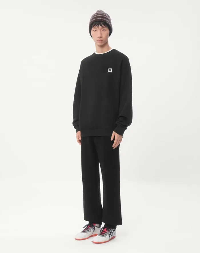 Valentino Tshirts And Sweatshirts Man Cotton Crewneck Sweatshirt With Chez Valentino Patch For Man In Black Black Valentino Tshirts And Sweatshirts Man Cotton Crewneck Sweatshirt With Chez Valentino Patch For Man In Black Black
