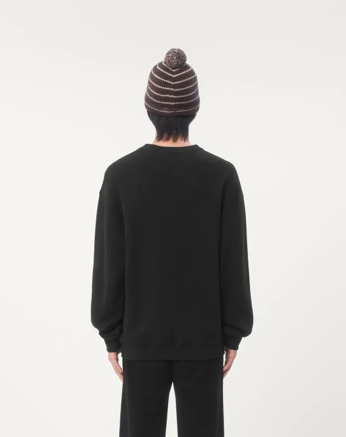 Valentino Tshirts And Sweatshirts Man Cotton Crewneck Sweatshirt With Chez Valentino Patch For Man In Black Black Valentino Tshirts And Sweatshirts Man Cotton Crewneck Sweatshirt With Chez Valentino Patch For Man In Black Black