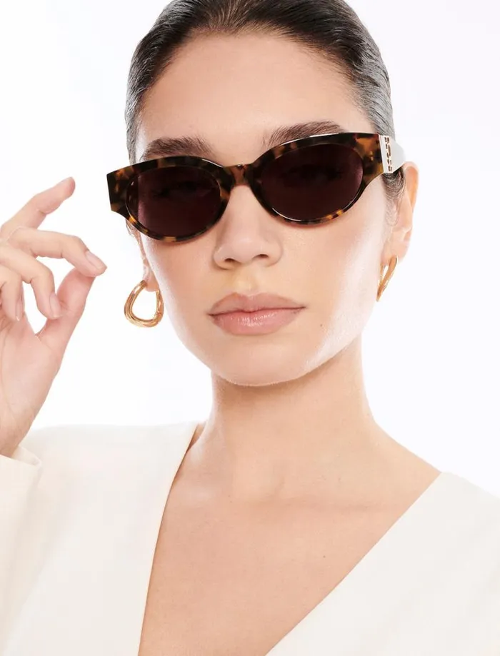 Women Signature Oval Icon Sunglasses Blonde Demi BCBG Sunglasses Women Signature Oval Icon Sunglasses Blonde Demi BCBG Sunglasses